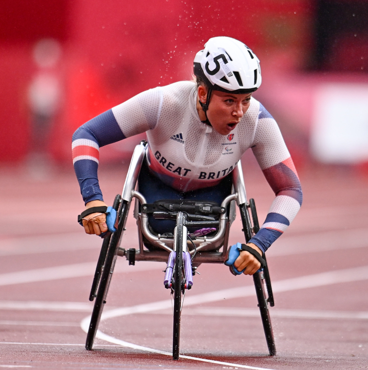 Paralympian racing in a wheelchair