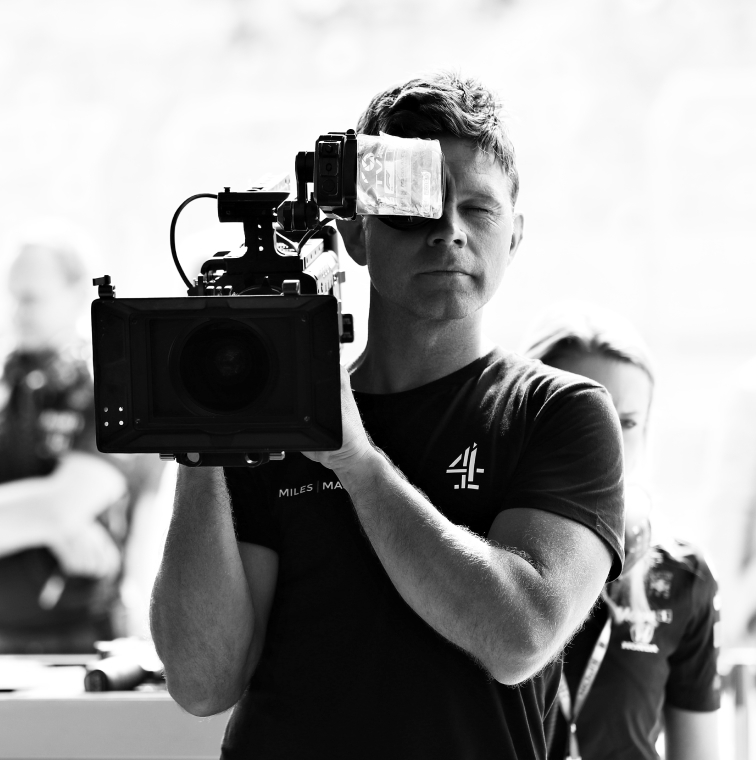 Man holding a professional video camera